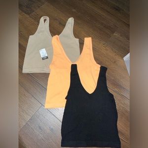 3 pc sleeveless Skin tight shirt